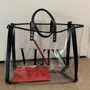 Valentino Garavani transparent tote bag. Metallic rock studs and VLTN logo.